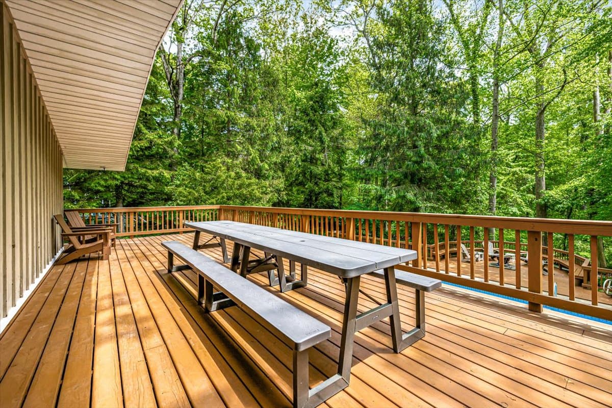 Spacious outdoor deck with picnic table for al fresco dining