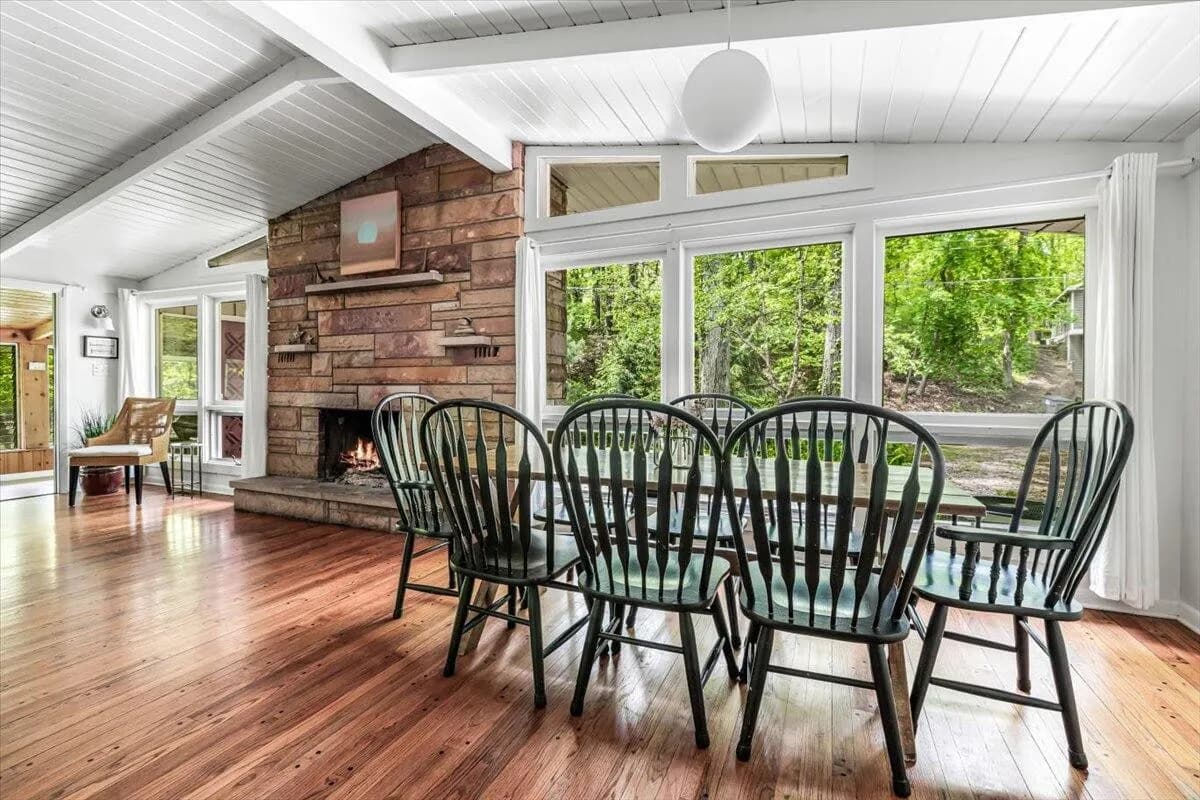 Dining Room with Stone Fireplace & Windsor Chairs